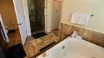 Master ensuite with separate glassed shower and water closet